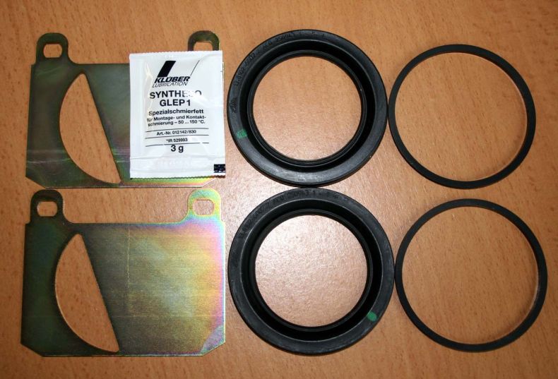 NEW FRONT CALIPER SEAL KIT 424/427